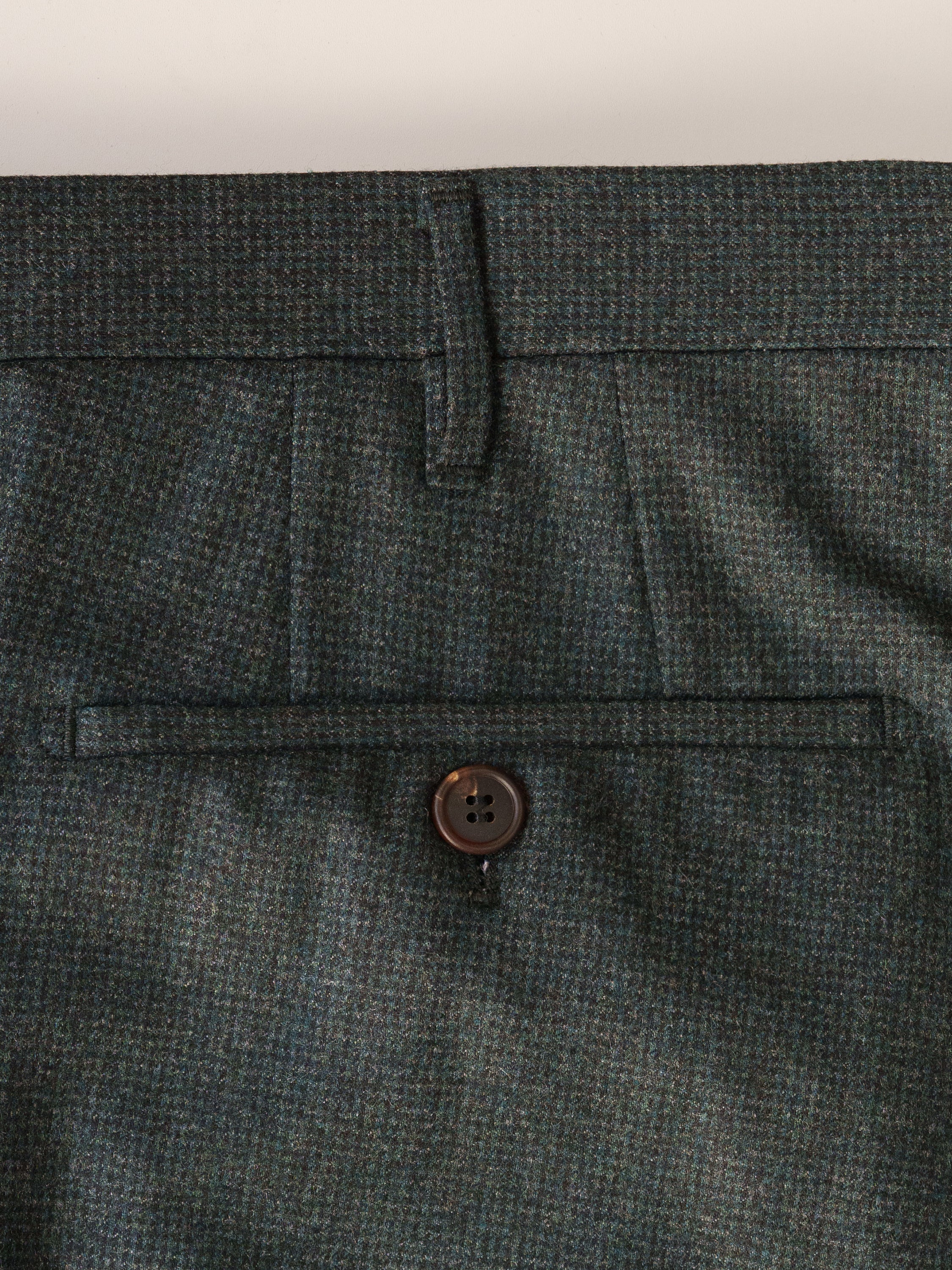 Dark green micro check flannel trousers